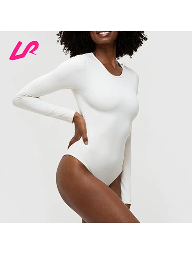 Our white long sleeve bodysuit is a must-have basic in any wardrobe. Versatile and stylish, perfect for any occasion. Shop now for a comfortable and chic look.